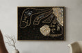 The Offering – original drawing by BOUS, gold on black, lifestyle room view